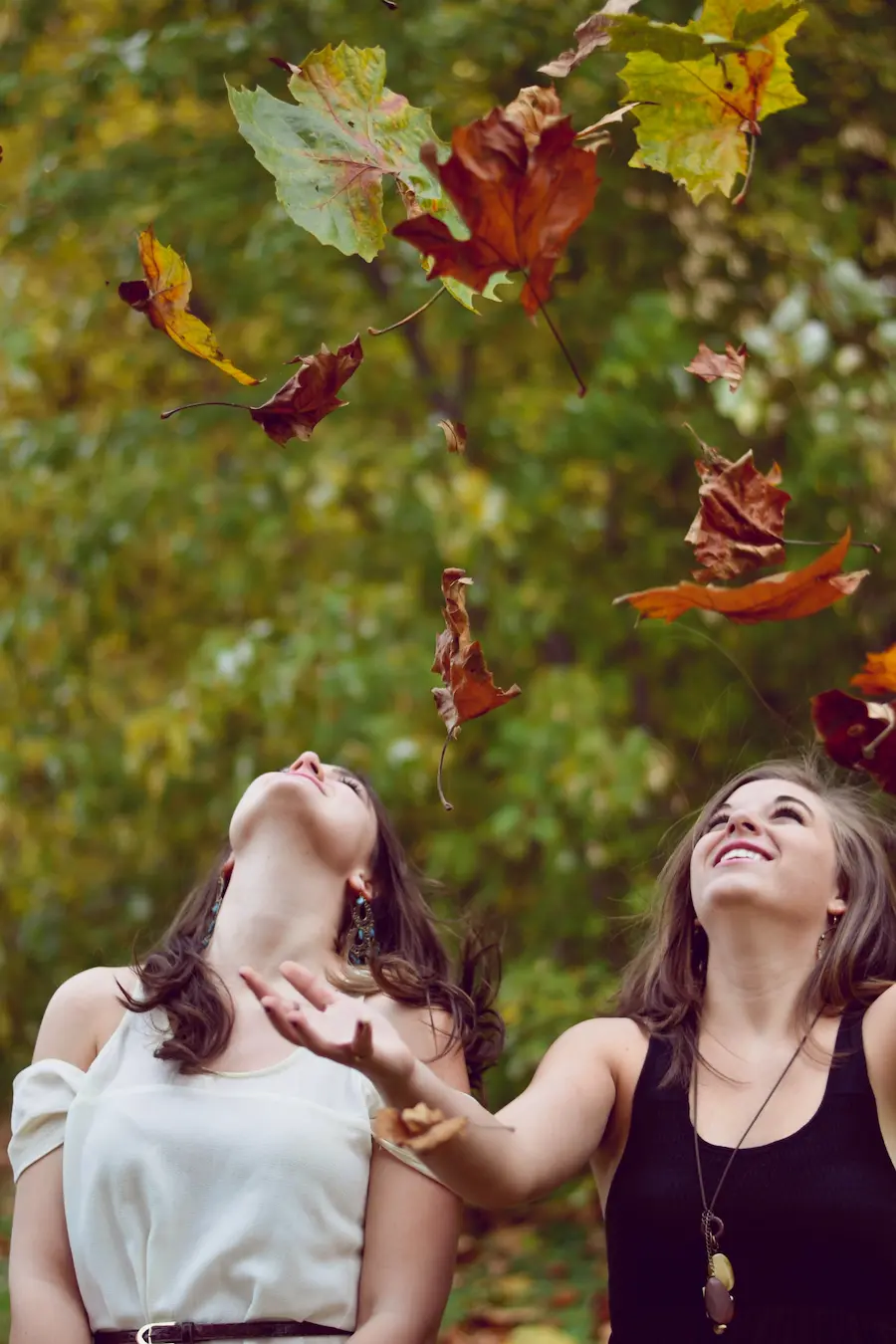 friends playing with leaves